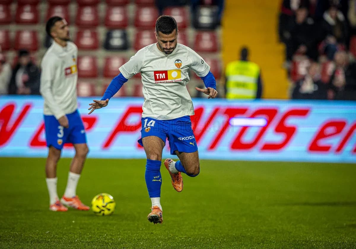 Jugadores del Valencia calentando antes del partido