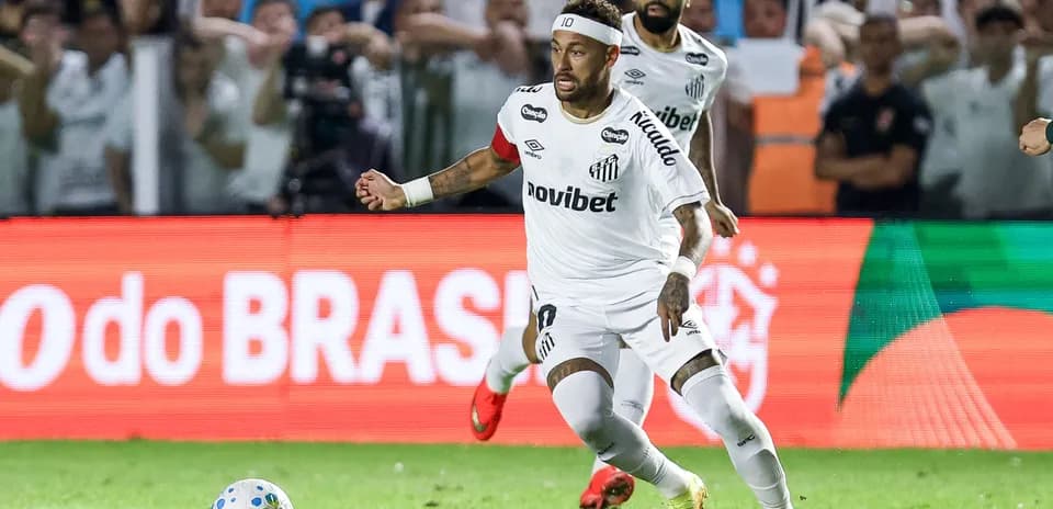 Neymar dribbling the ball during a match