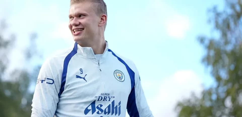 Jugador de Manchester City entrenando en campo