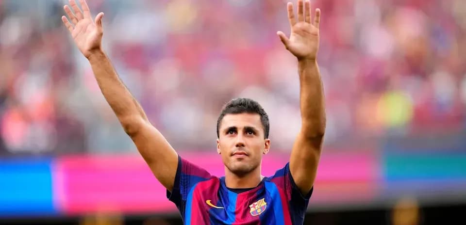 Jugador de Barcelona saludando a la afición