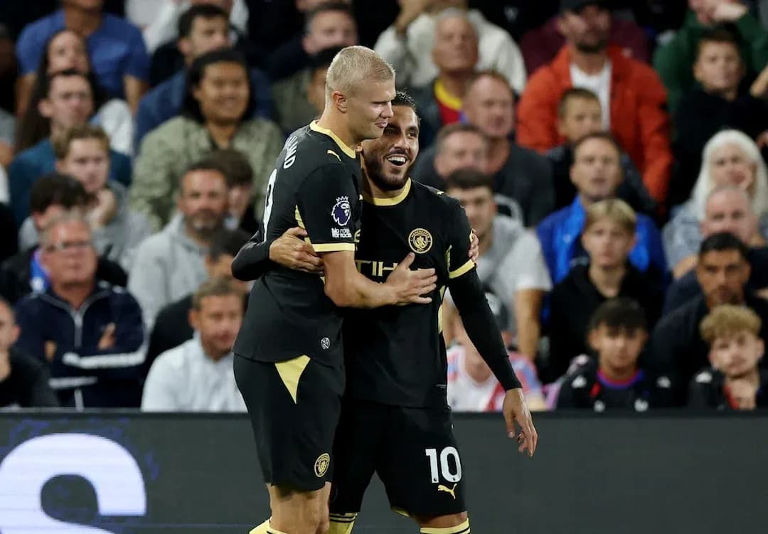 Jugadores de Manchester City celebrando un gol