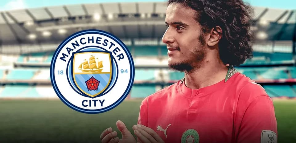Jugador de Manchester City en el estadio con logo