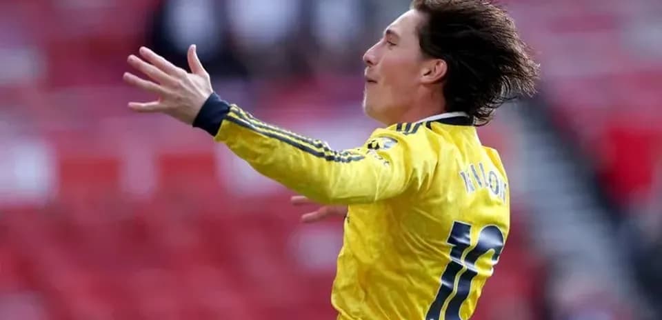 Jugador celebrando un gol en el campo