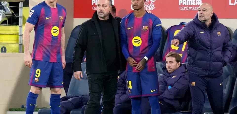 Jugadores del Barcelona en el banquillo durante partido