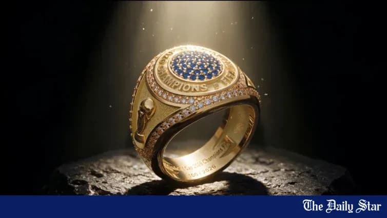 An ornate championship ring with blue gemstones