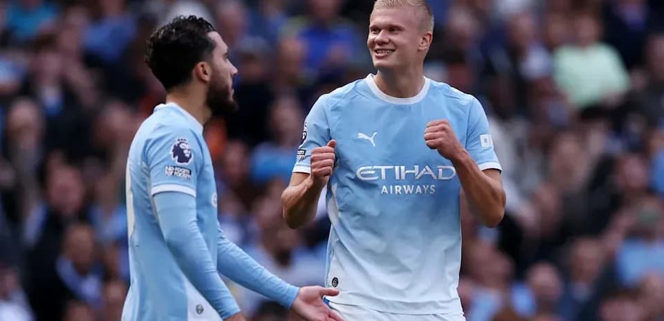 Jugadores de Manchester City celebrando un gol