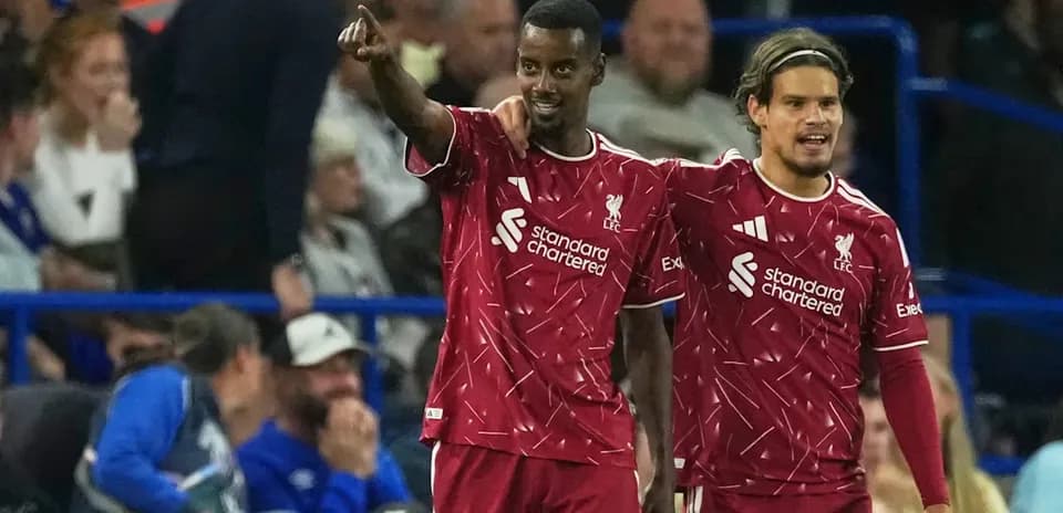 Jugadores de Liverpool celebrando un gol en partido