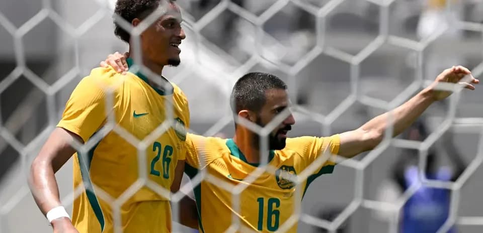 Jugadores australianos celebrando un gol en el partido