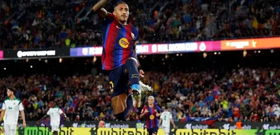 Jugador de Barcelona celebrando un gol en el estadio