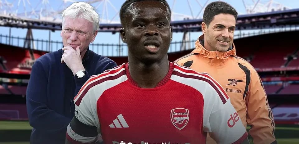 Entrenadores y jugador en el estadio de Arsenal