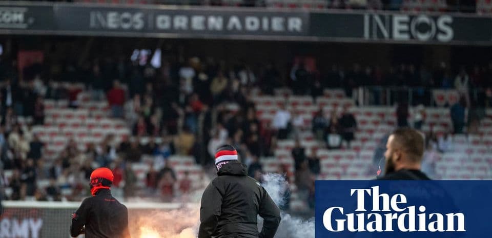 Aflare ignited by fans during a football match