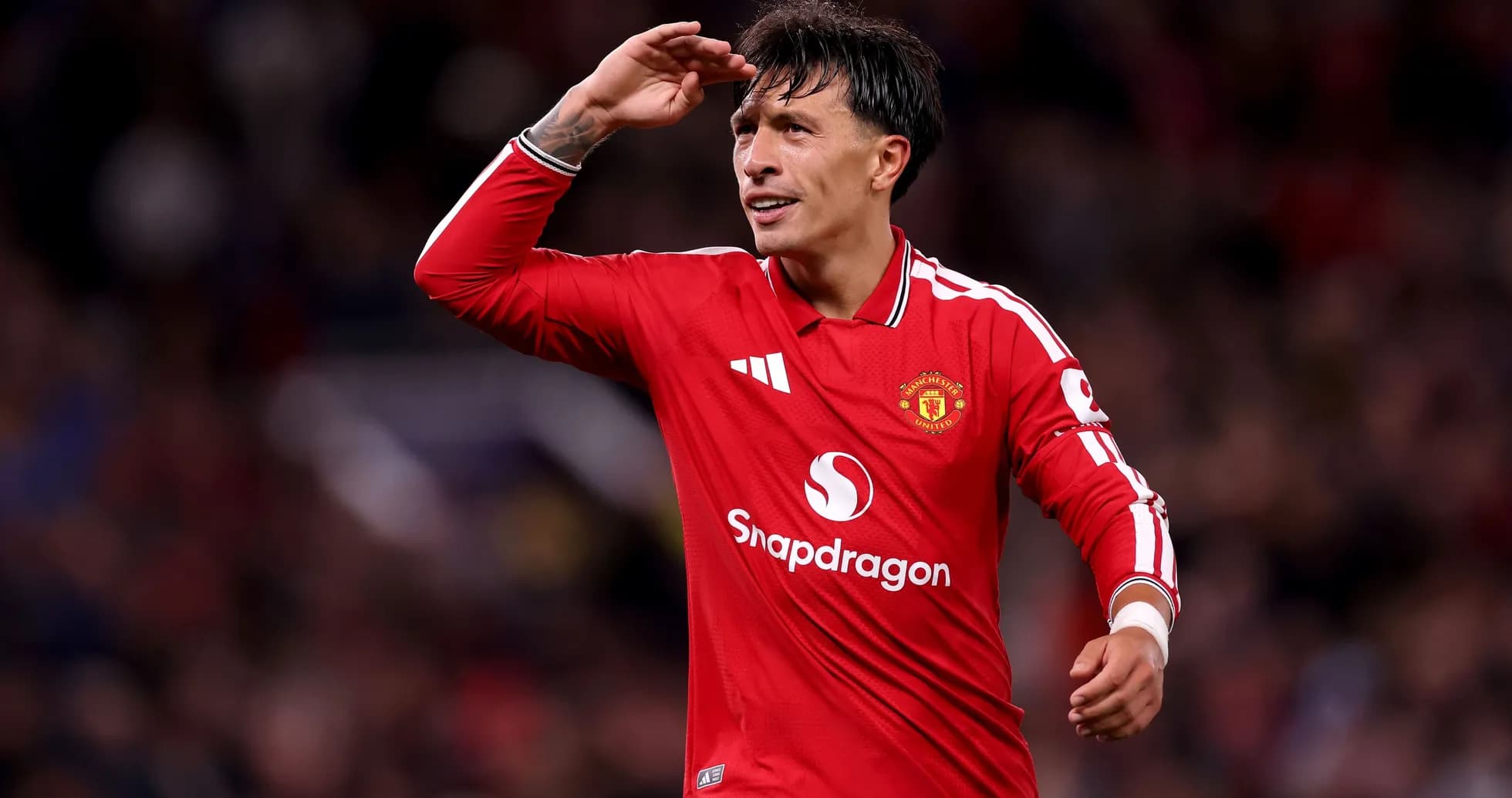 Jugador de Manchester United saludando al público