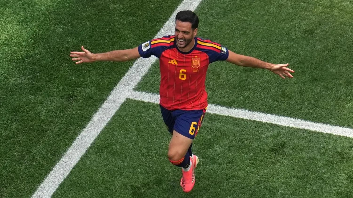 Jugador español celebrando un gol