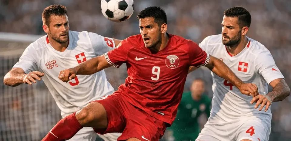 Jugador de Qatar disputando el balón con Suiza