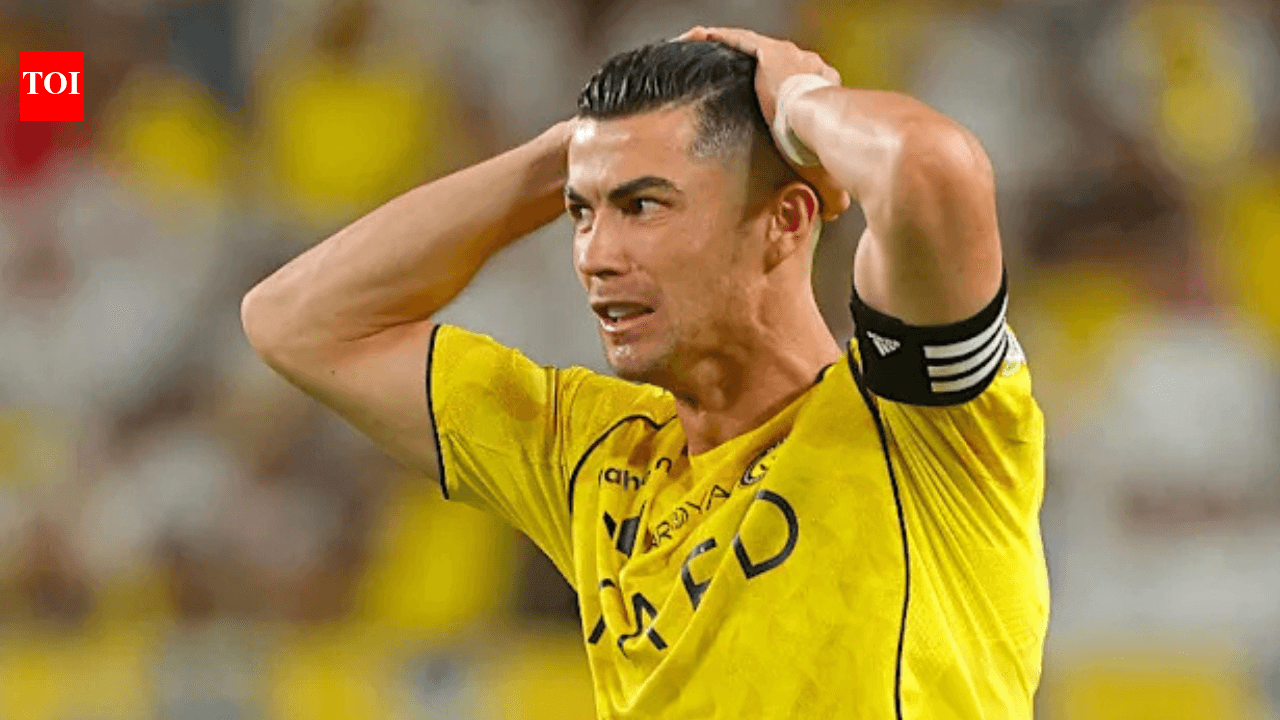 Jugador sosteniendo la cabeza en señal de frustración