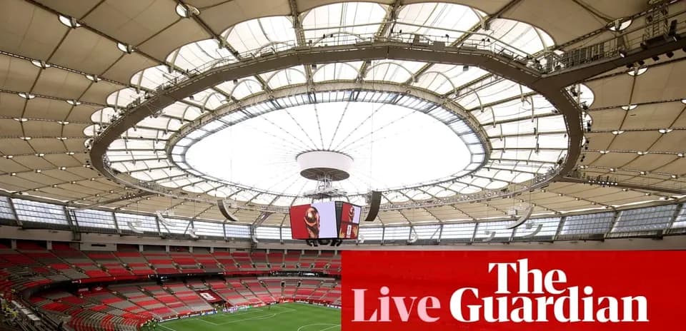 Interior view of stadium with large roof structure