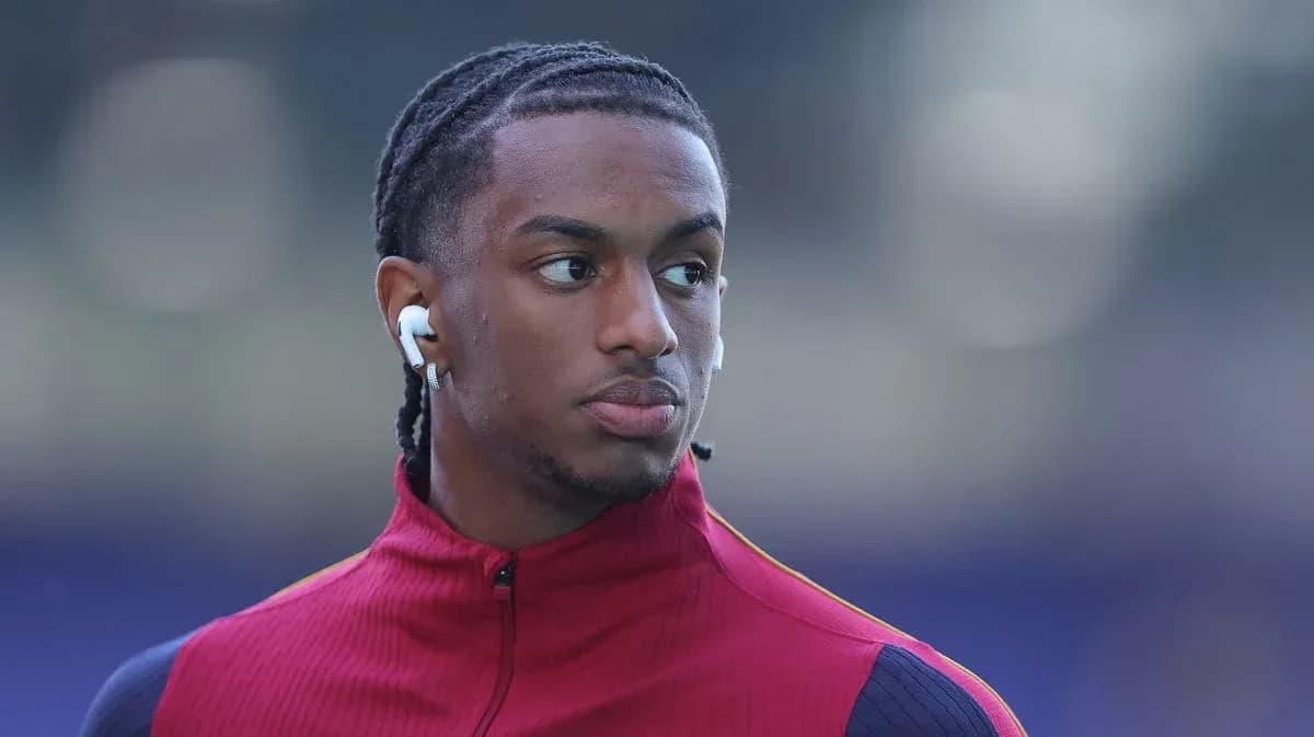 Jugador con auriculares en calentamiento previo