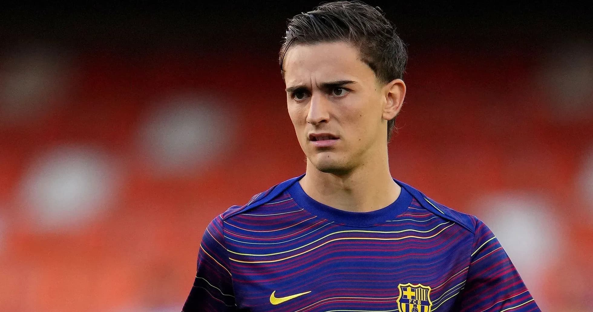 Jugador de Barcelona en calentamiento antes del partido Jugador de Barcelona en calentamiento antes del partido