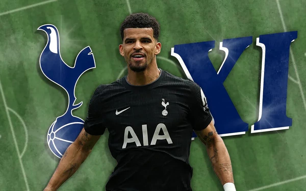 Jugador de Tottenham con camiseta negra en el campo Jugador de Tottenham con camiseta negra en el campo