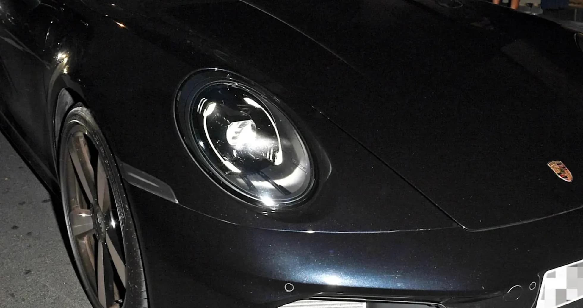 Dos hombres en un Porsche en la calle Dos hombres en un Porsche en la calle