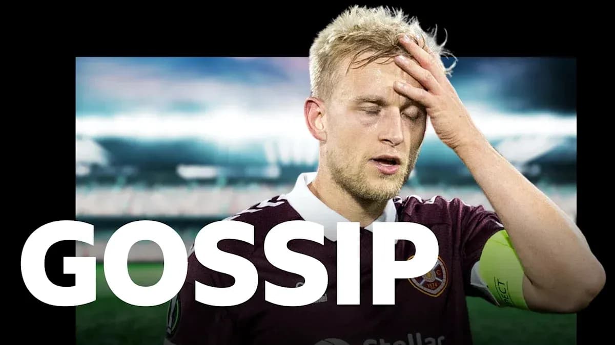 Jugador con camiseta de Hearts tocándose la frente Jugador con camiseta de Hearts tocándose la frente