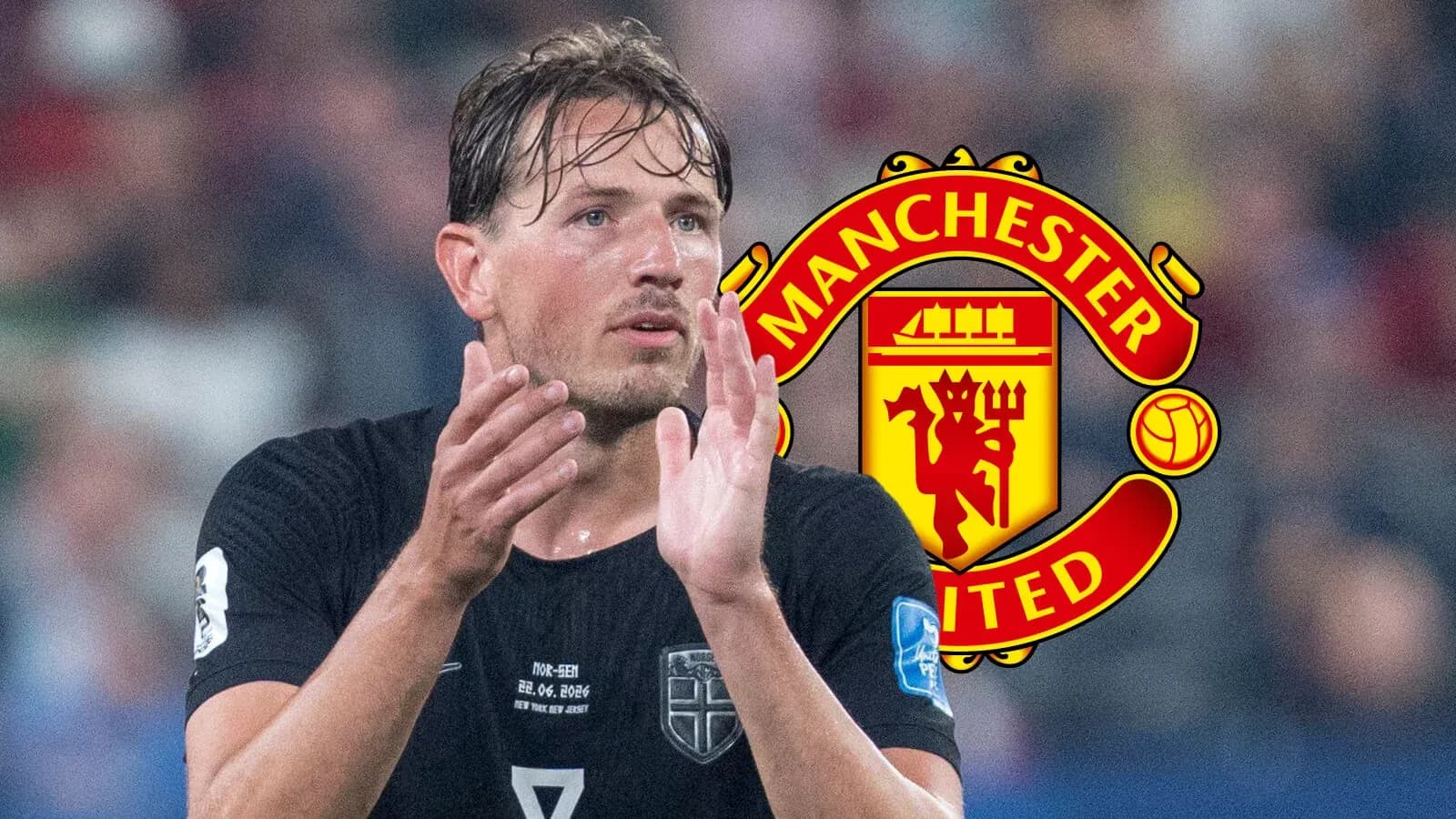 Jugador aplaudiendo con el logo de Manchester United Jugador aplaudiendo con el logo de Manchester United