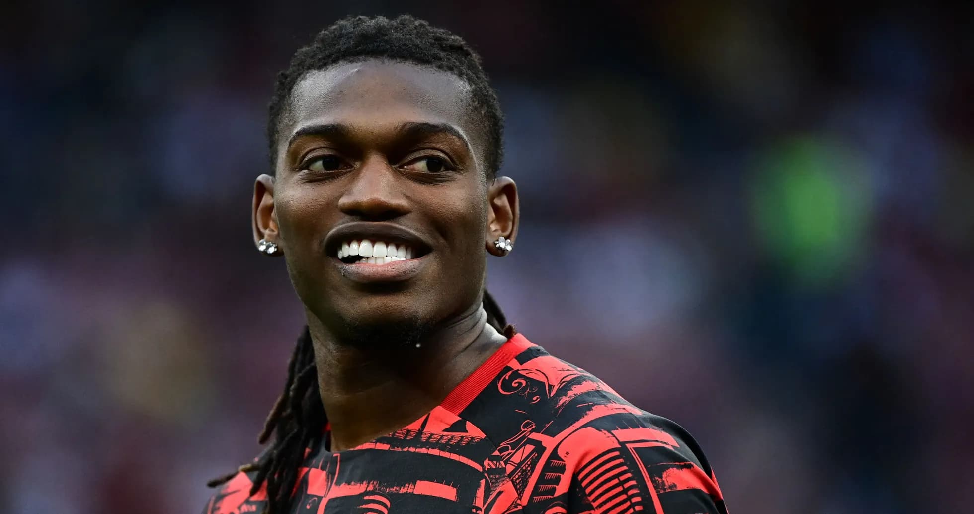 Jugador sonriendo antes de un partido Jugador sonriendo antes de un partido