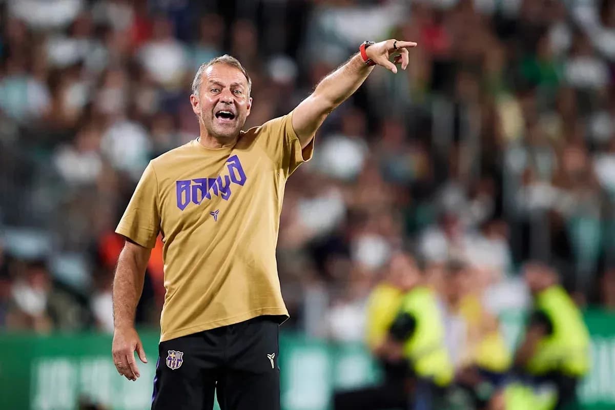 Entrenador dirigiendo a su equipo durante el partido Entrenador dirigiendo a su equipo durante el partido