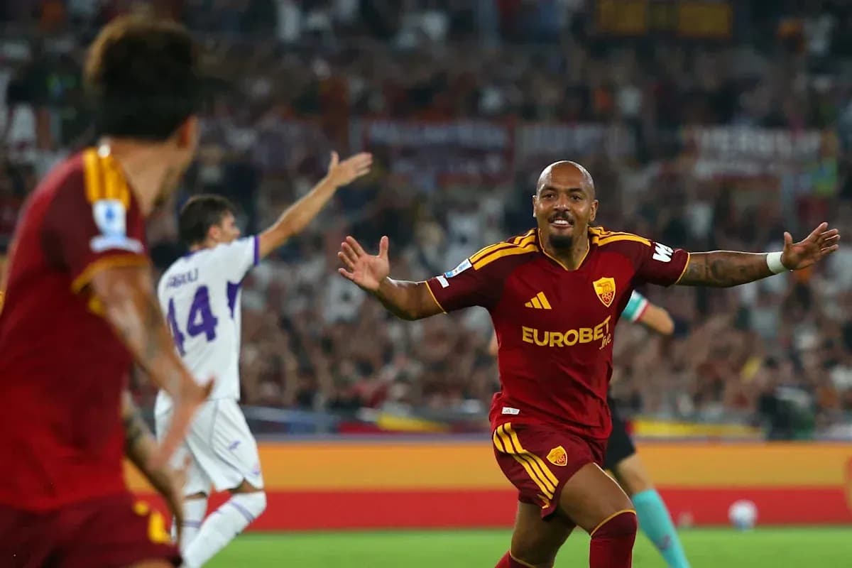 Jugador de Roma celebra un gol en el partido Jugador de Roma celebra un gol en el partido